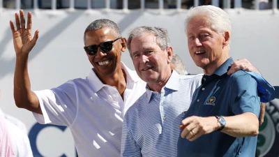 Bush, Clinton And Obama NGO Teams Up With AmEx Global To Fly Migrants Into The US