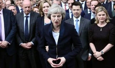 Theresa May with rhombus hand gesture
