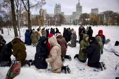 Ukrainian Christians pray outdoors, in the snow, for their country in this phase of war danger.