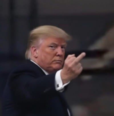 A video shows the president flipping off a heckler during a visit to a Ford plant in Michigan. - Watch